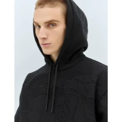 Hoodie med logoapplikation