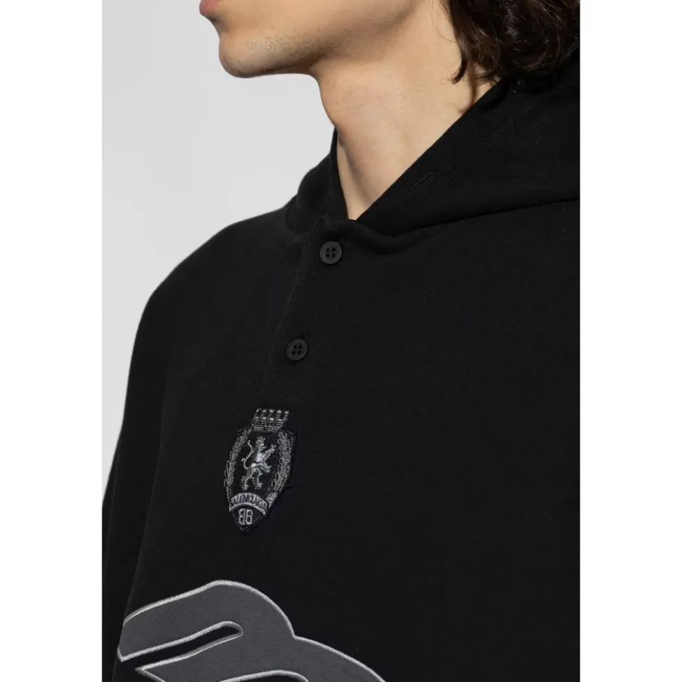 Sweatshirt med patches