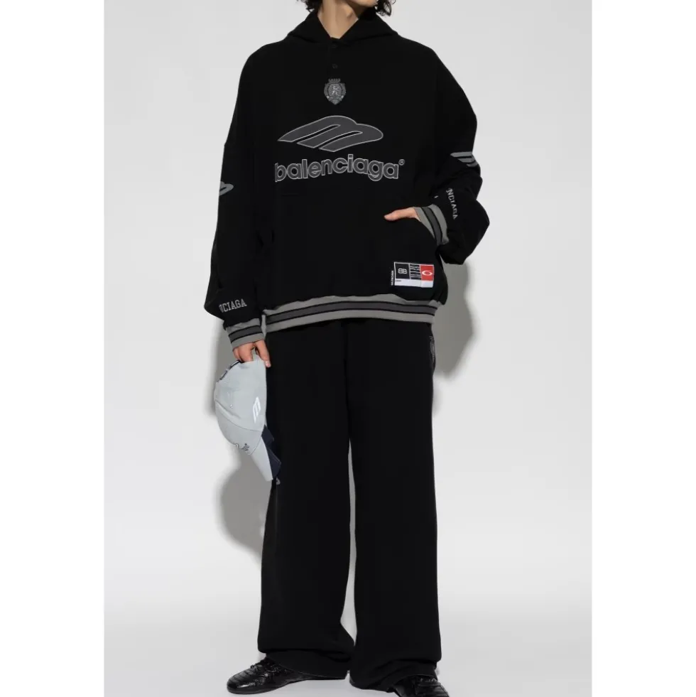 Sweatshirt med patches